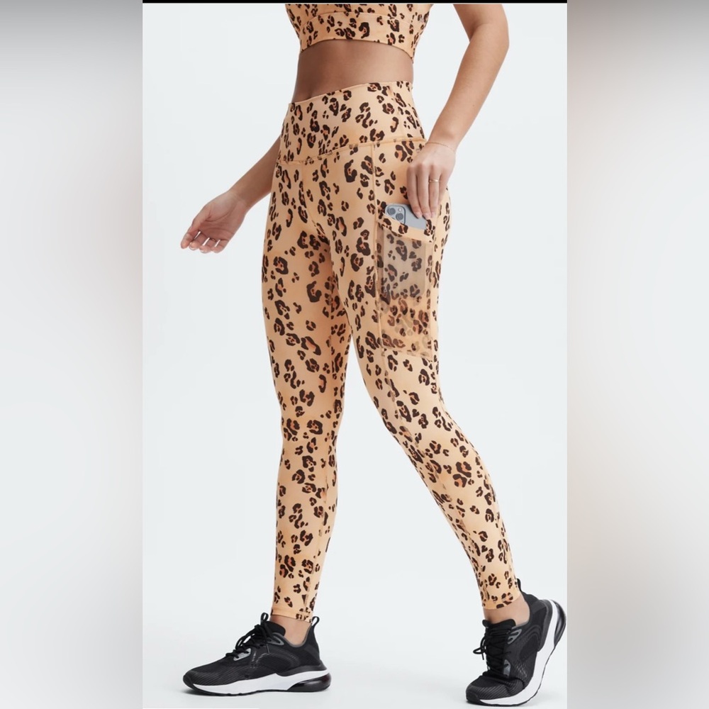 Fabletics Front Twist Long Sleeve Top and matching leggings in desert leopard